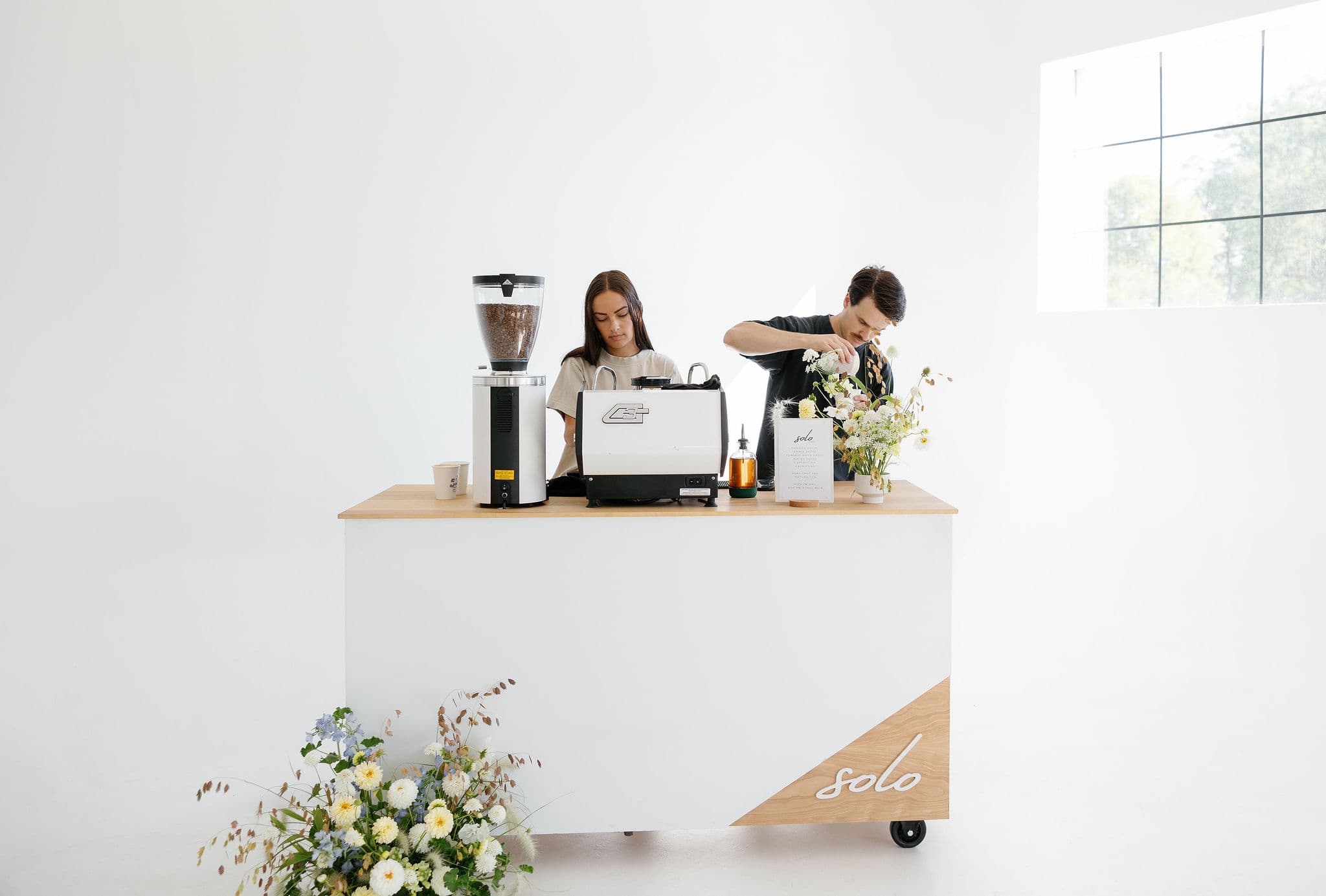 Baristas crafting coffee