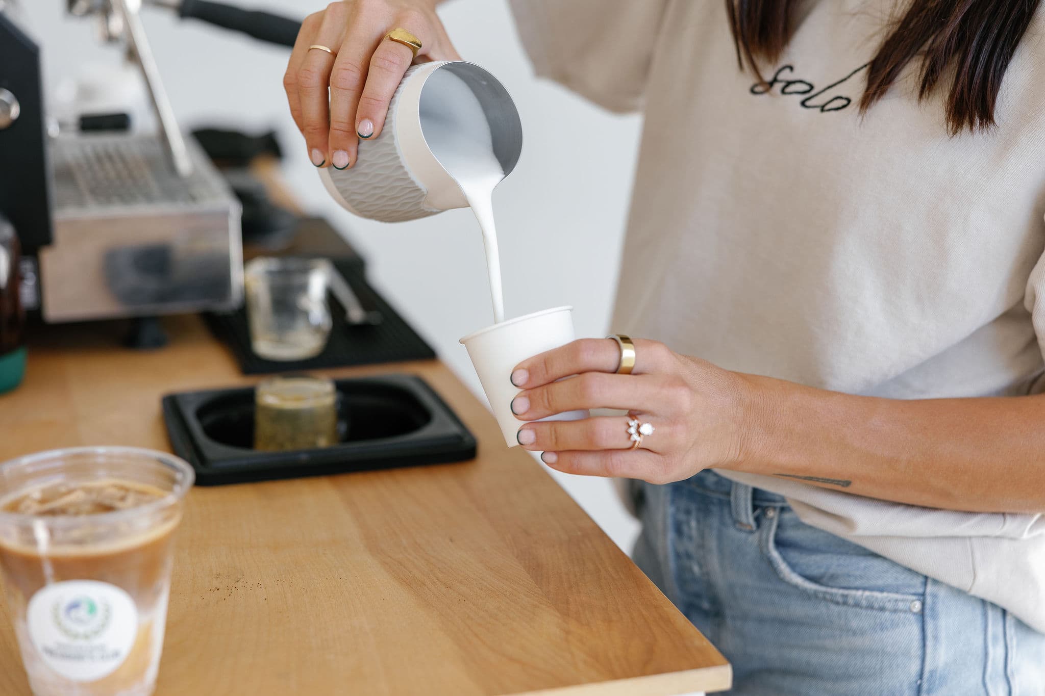 Barista pouring latte art