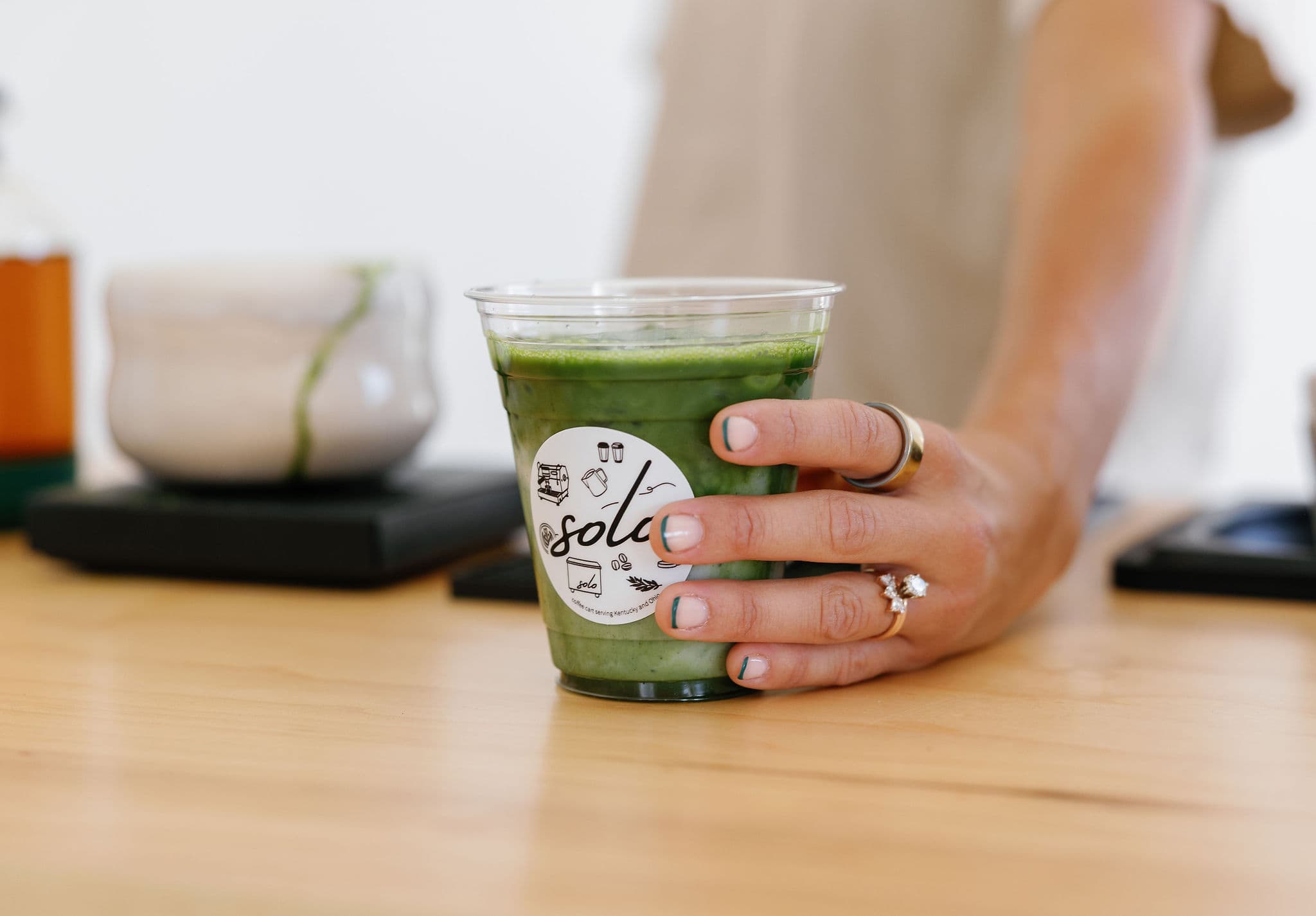 Barista serving matcha